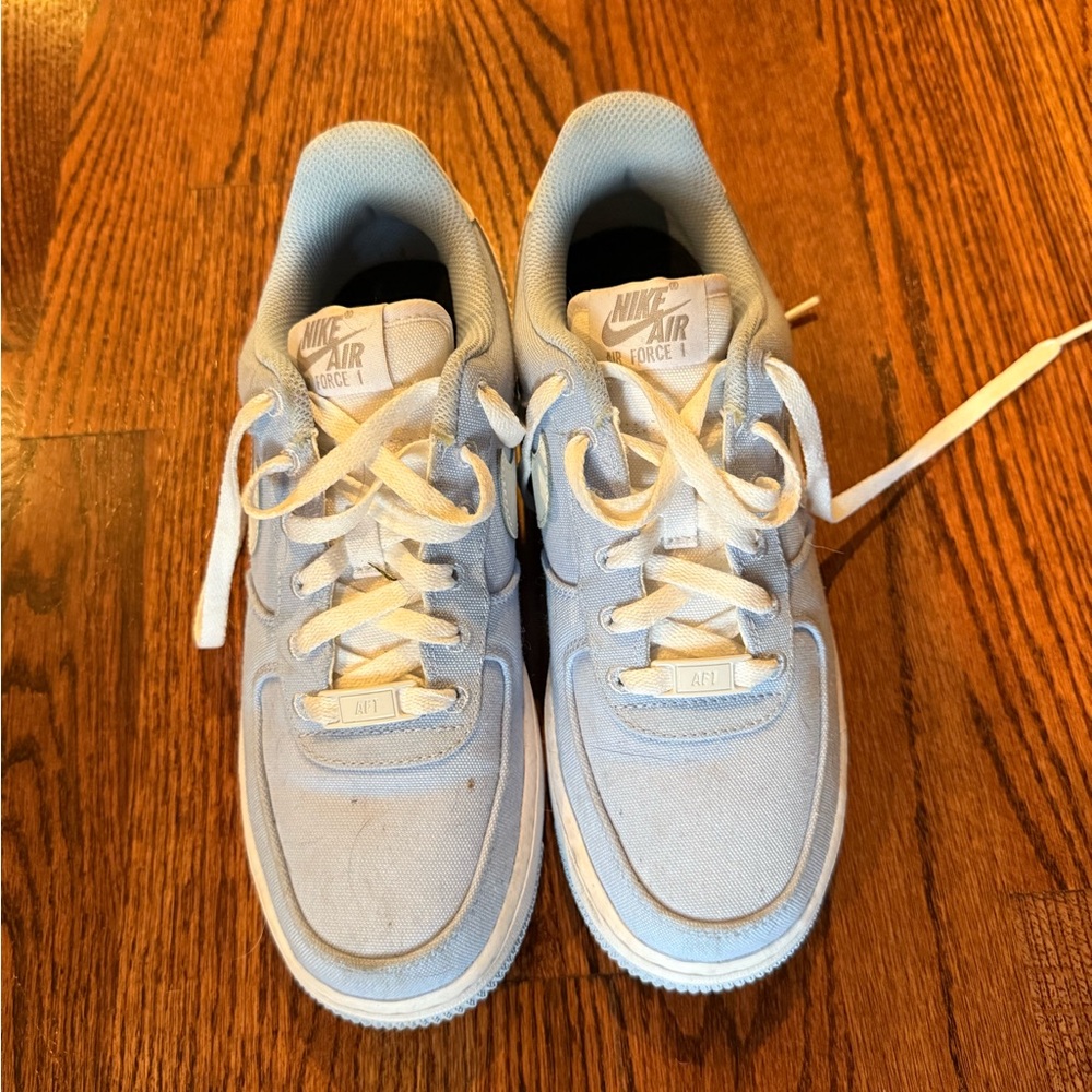Nike Blue and White Sneakers with Sleek Design